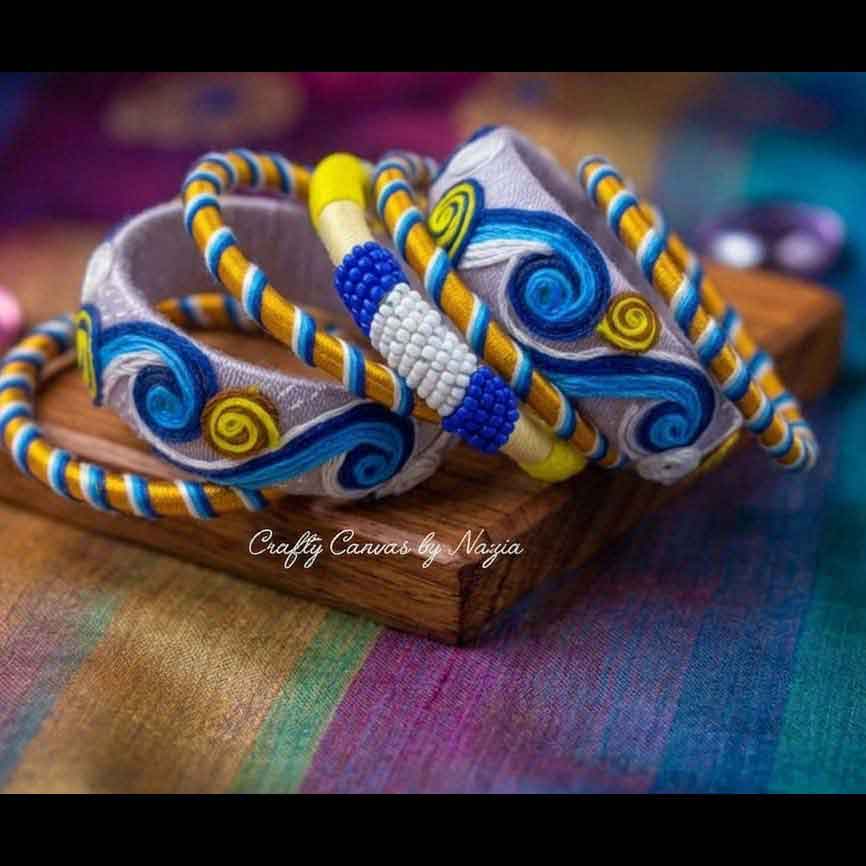 Crafty_Canvas_by_Nazia_CCB-03_04 Blue & Yellow Spiral Thread Bangles - Image 1